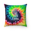 colorful tie-dye pillow with white text 'It's Just A T21 3.21 Thing' for down syndrome awareness