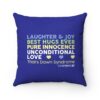 Blue pillow with blue, green, yellow, and white text 'laughter and joy, best hugs ever, pure innocence, unconditional love, that's Down Syndrome' for down syndrome awareness