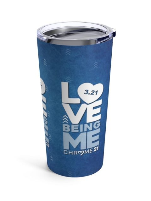 blue tumbler travel mug with white and light blue text 'Love being me' for down syndrome awareness