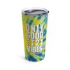 blue and yellow tie-dye travel mug tumbler with white text 'Only good T21 Vibes' for down syndrome awareness