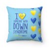 light blue pillow with yellow and blue hearts and blue text 'I (heart) someone with Down syndrome' with '3.21' written in the heart for down syndrome awareness