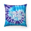 blue and purple tie-dye pillow with white text 'humble and kind'