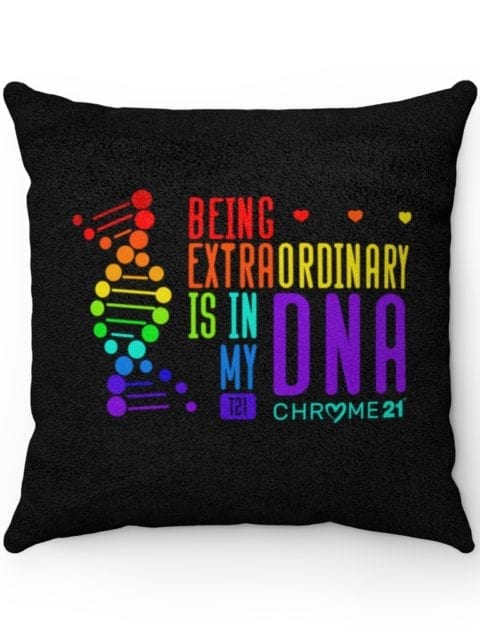 black down syndrome pillow with colorful DNA strand and colorful text 'being extraordinary is in my DNA'