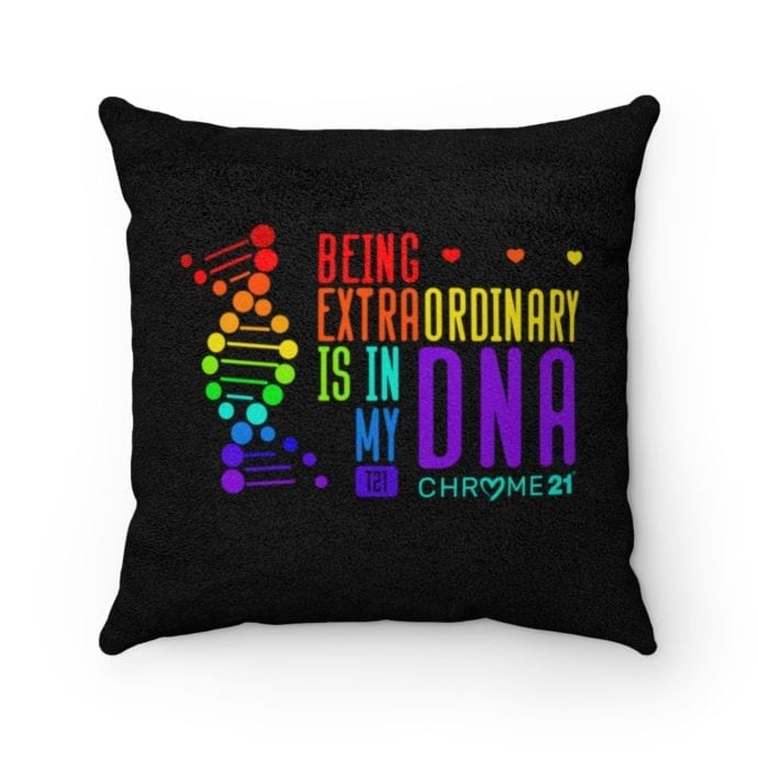 black down syndrome pillow with colorful DNA strand and colorful text 'being extraordinary is in my DNA'
