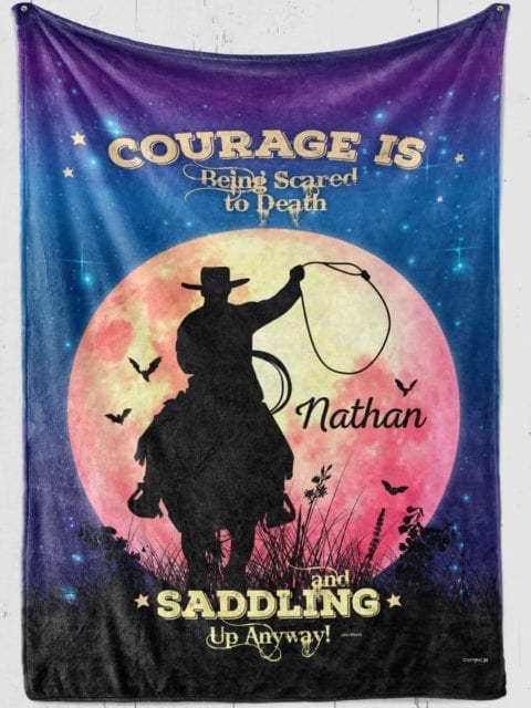 Personalized Cowboy blanket on moonscape and stars background with cowboy and bats flying 'Courage is being scared to death [name] and saddling up anyway!'
