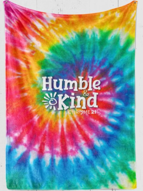 Custom blanket with Tie dye on colorful plush fleece with sunshine and yellow, green, blue, pink with white text 'Humble & Kind'