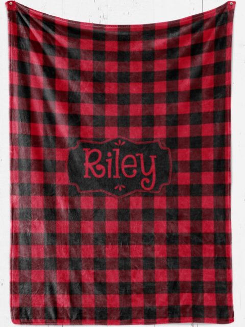 Personalized Blanket in red and black flannel style checks with [name] in middle