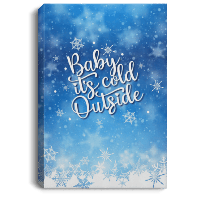 Christmas Canvas Artwork with blue sky and white snowflakes falling with words 'Baby It's Cold Outside'